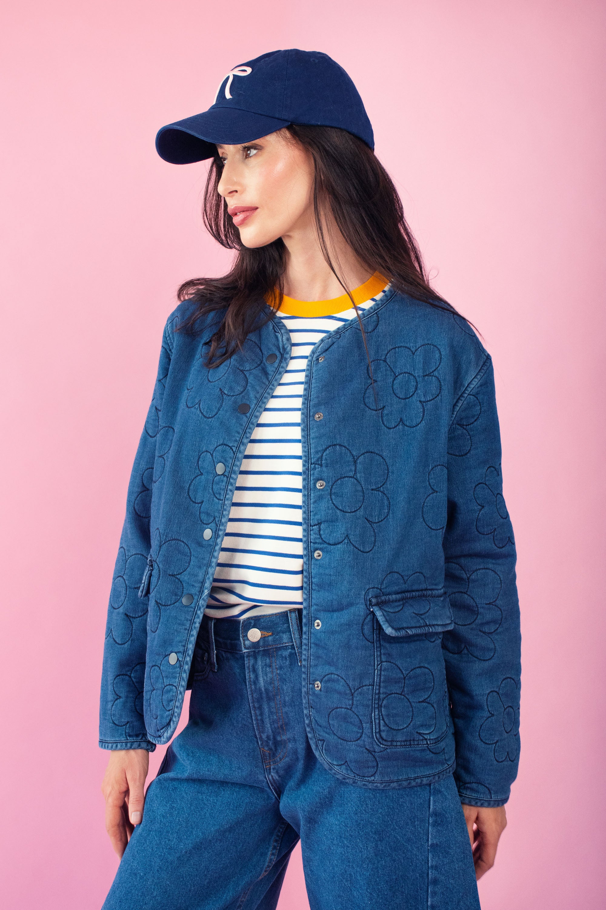 Model wearing quilted flower denim trucker