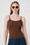 Model is wearing a brown cami with jeans by Me&B