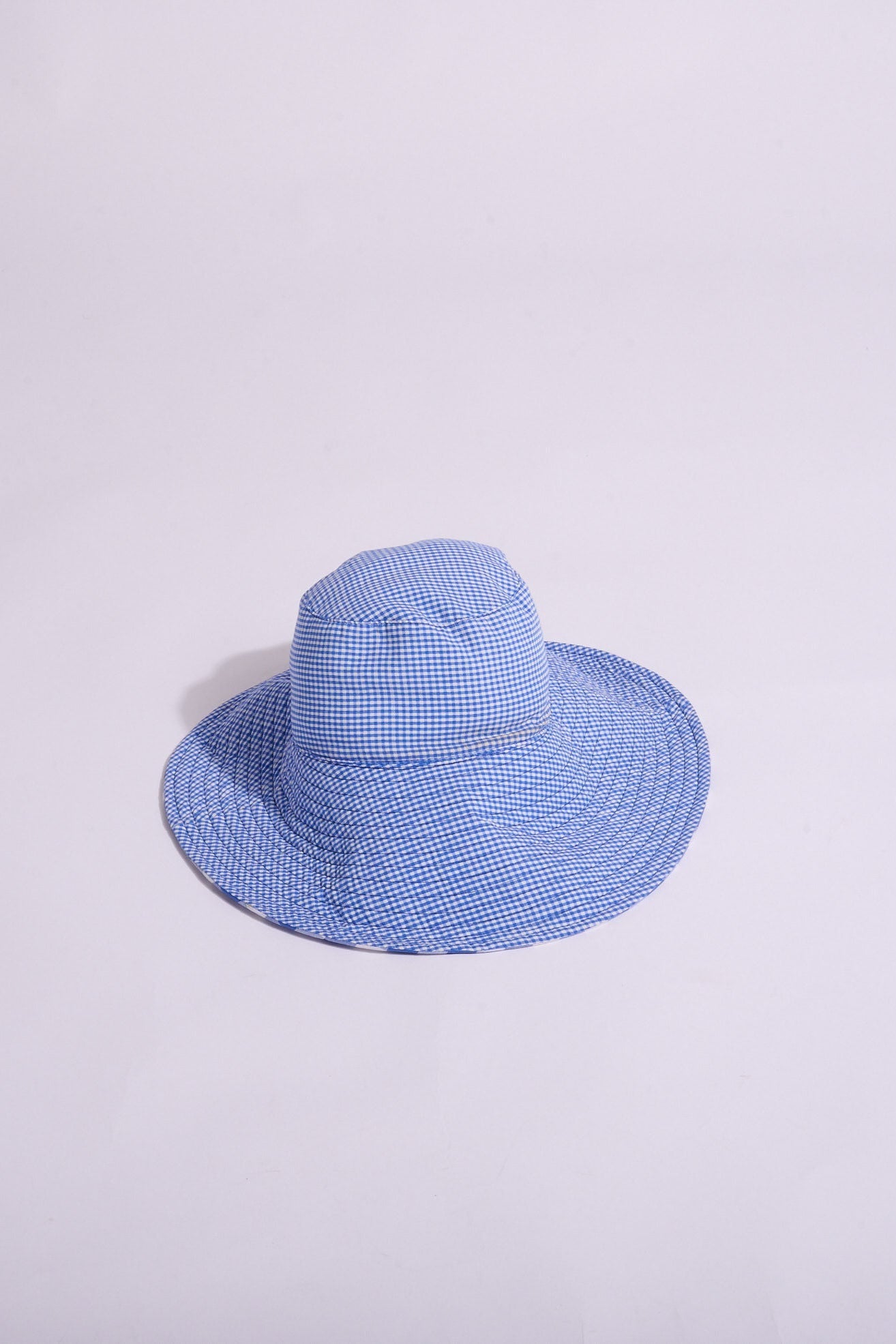 Blue checkered hat on a white background