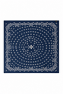 A square bandana featuring a classic indigo blue background with a white circular paisley and floral mandala pattern.