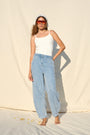 Bleached wash lyocell jeans with an elasticated waistband and side pockets