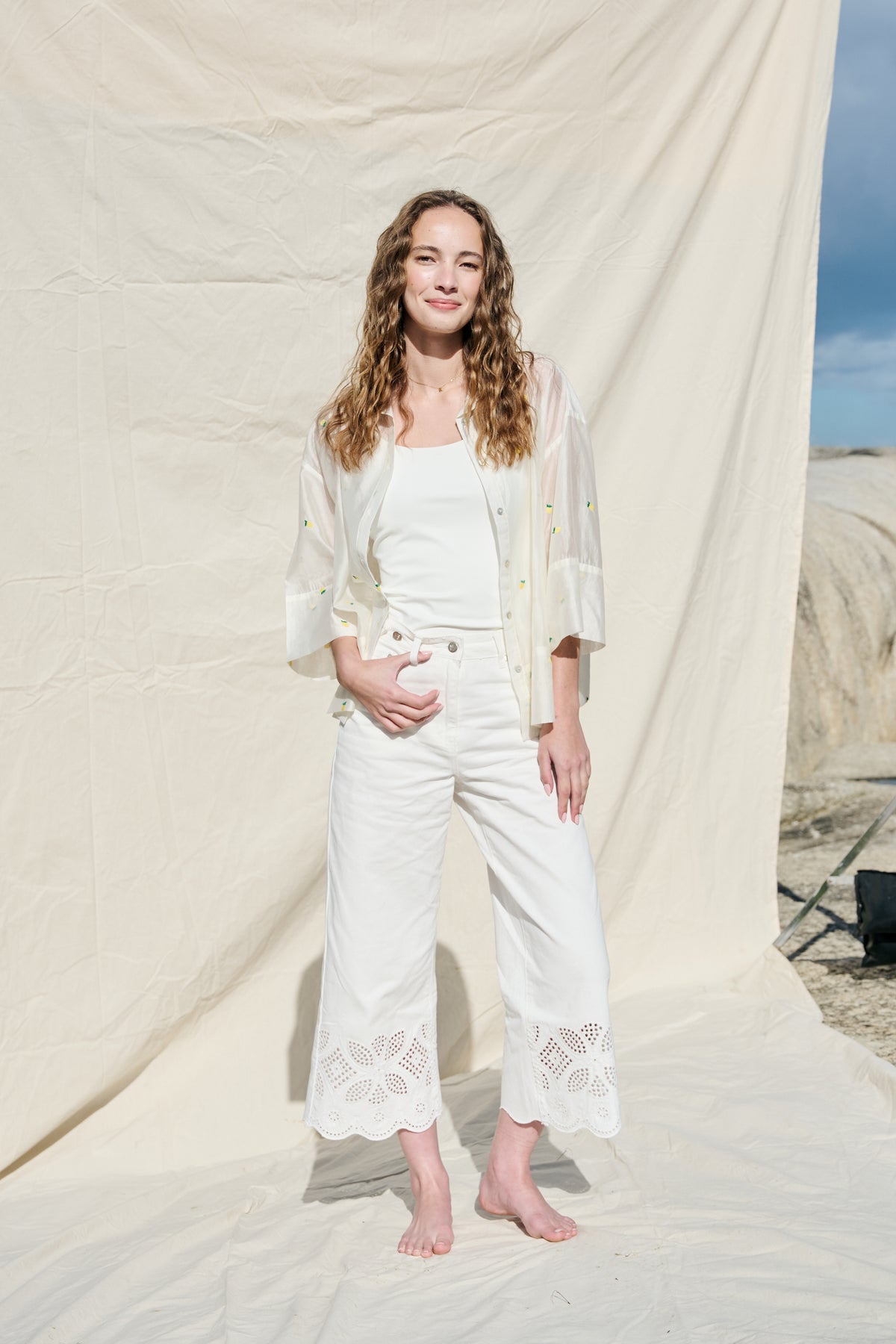 White button-up shirt with embroidered lemons and wide cuffs
