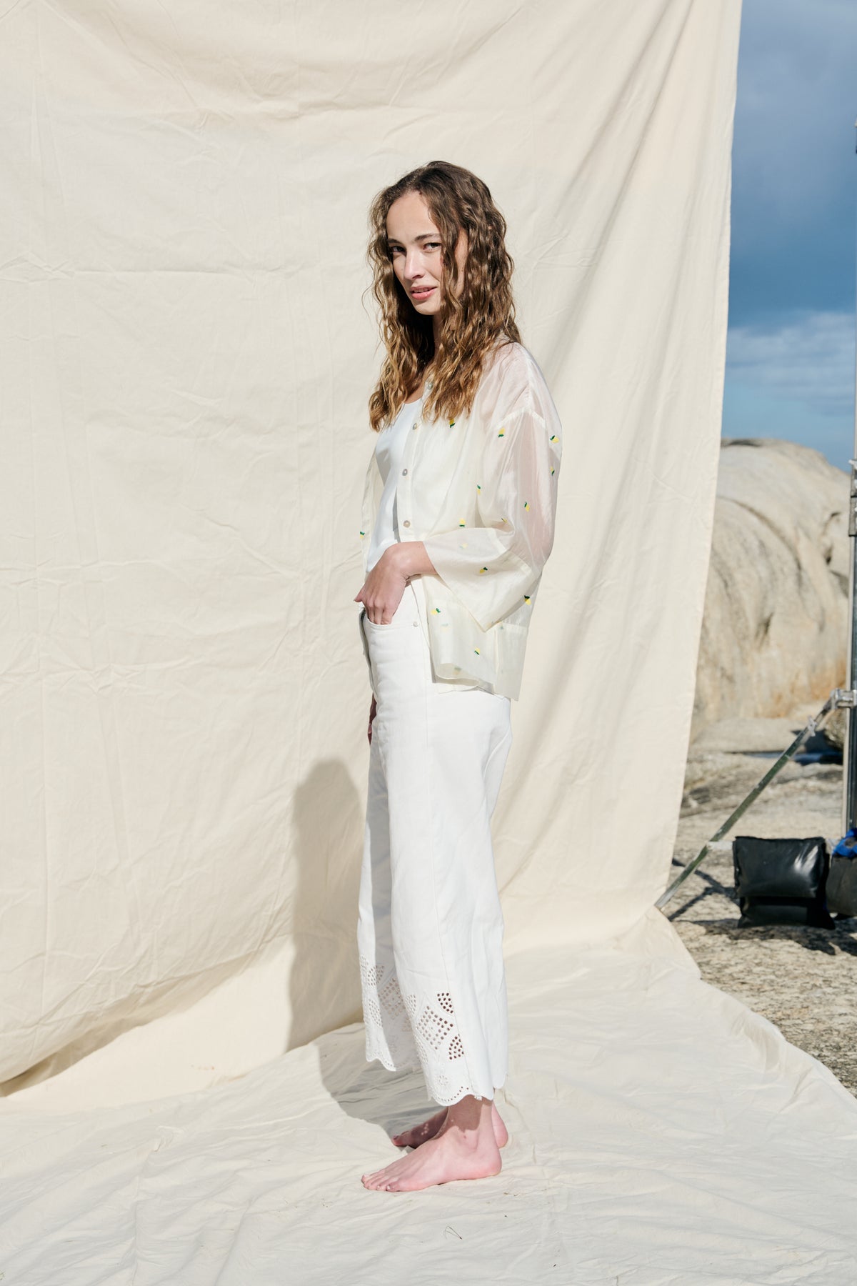 White button-up shirt with embroidered lemons and wide cuffs