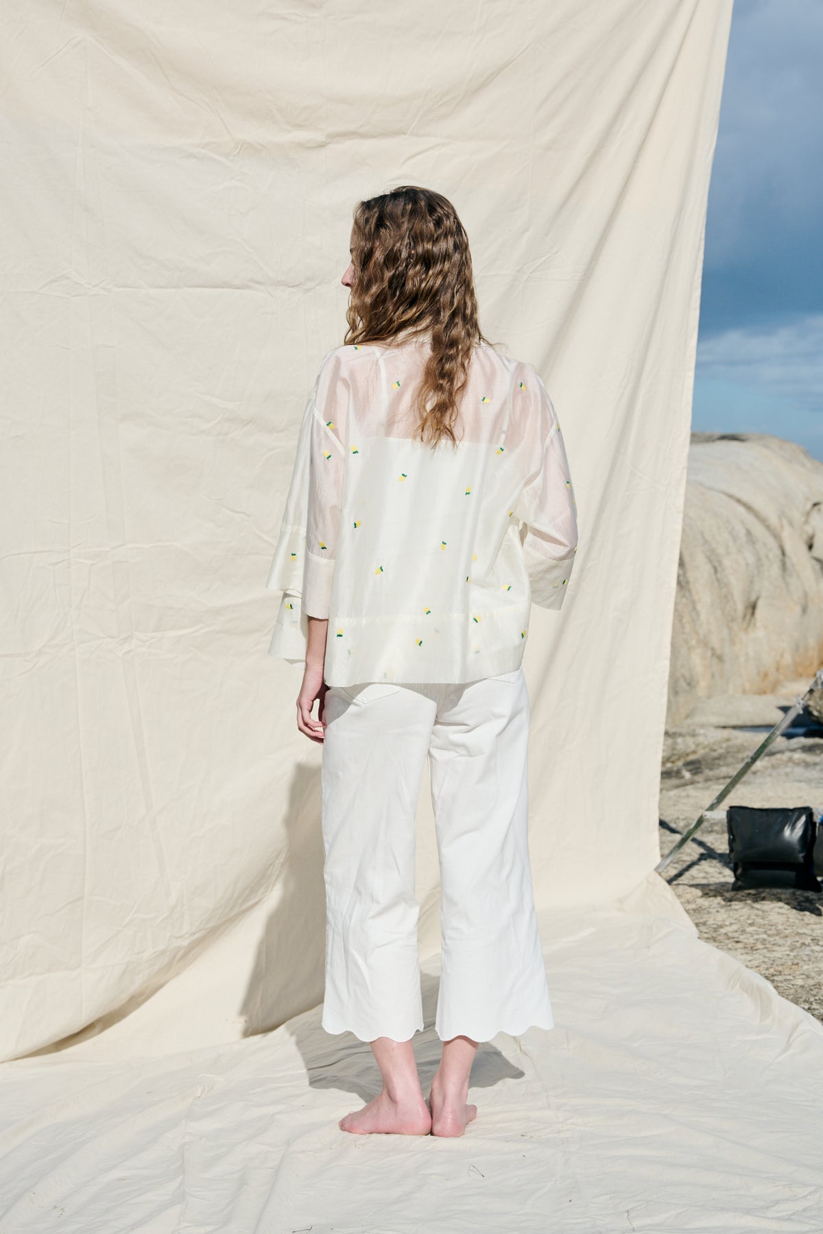 White button-up shirt with embroidered lemons and wide cuffs
