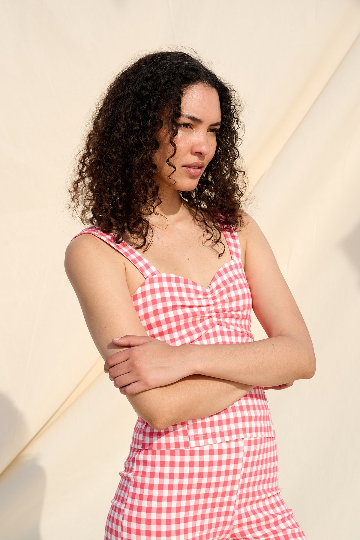 Red and white gingham top with wide straps and a ruched sweetheart neckline