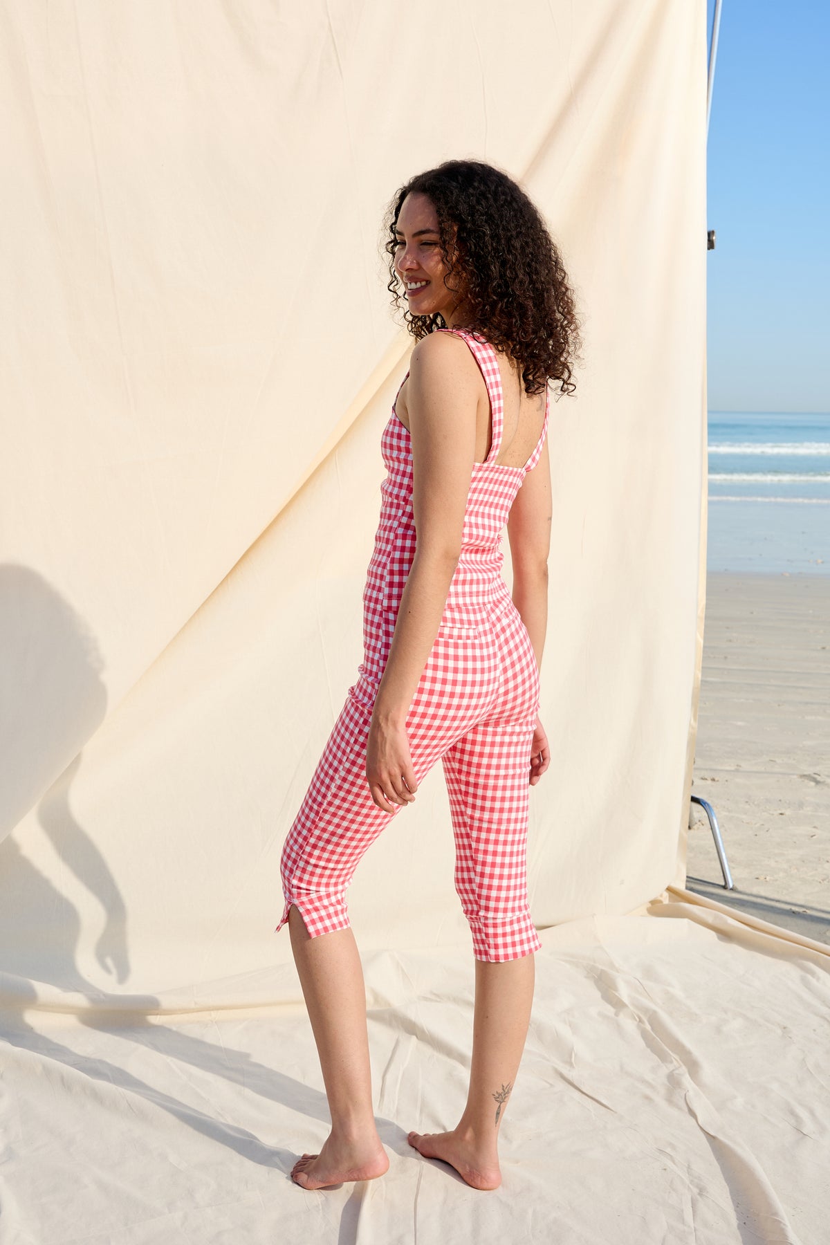 Red and white gingham top with wide straps and a ruched sweetheart neckline