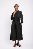 Model wearing a Black linen dress