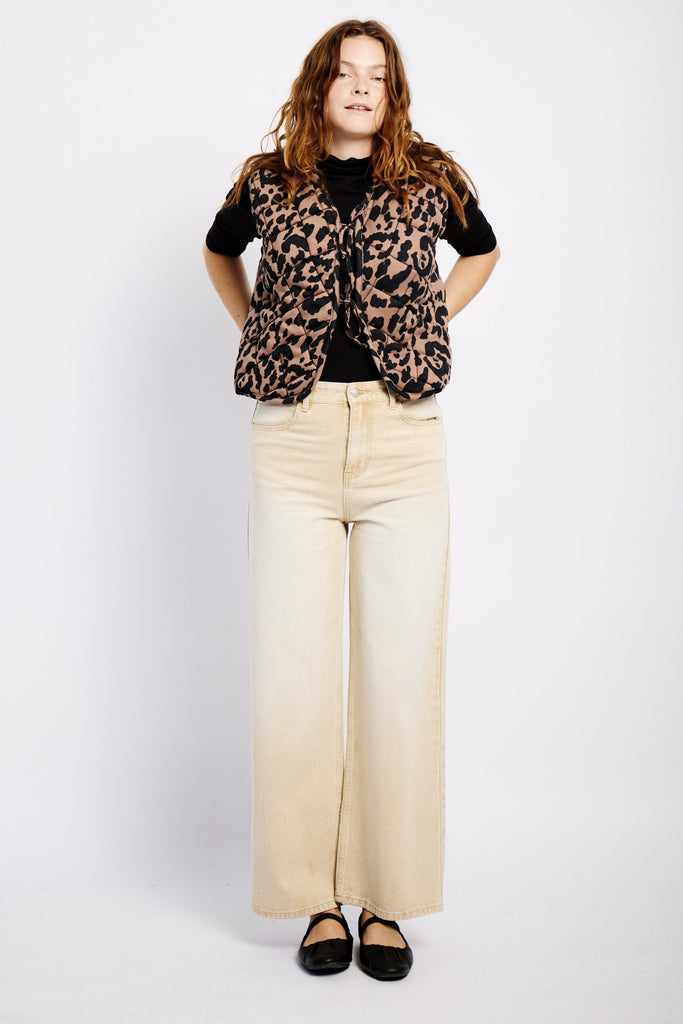 Model wearing wide leg jeans, mocha coloured, with adjustable waist details