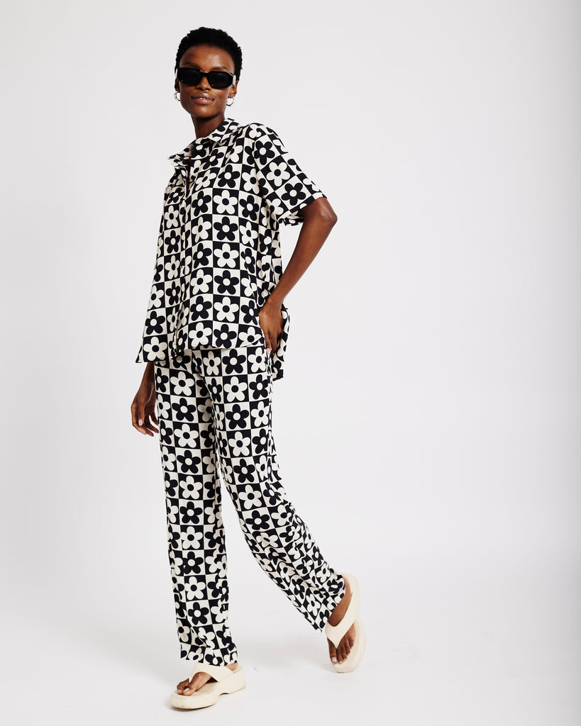 Me&B. Women's Clothing. Pants. Elasticated Trousers. Patterned Trousers. 60s Daisy Print Trousers. Locally made in Cape Town