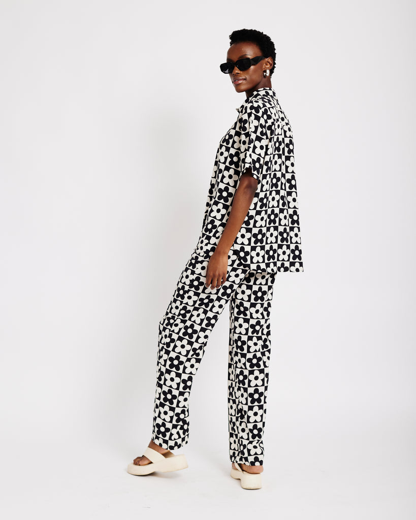 Me&B. Women's Clothing. Pants. Elasticated Trousers. Patterned Trousers. 60s Daisy Print Trousers. Locally made in Cape Town