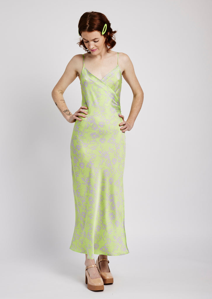 Me&B. Women's clothing. Dress. Satin Maxi Dress. Green Floral Satin Dress. Faux Wrap Dress. V Neckline Satin Dress. Satin Maxi Dress with Side Slit. Produced in South Africa.