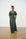 Model is wearing a brown and green satin maxi dress with shoes by Me&B