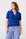 Model is wearing a cobalt ribbed short sleeve top