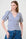 Model is wearing a blue and milk wrap top with denim jeans by Me&B