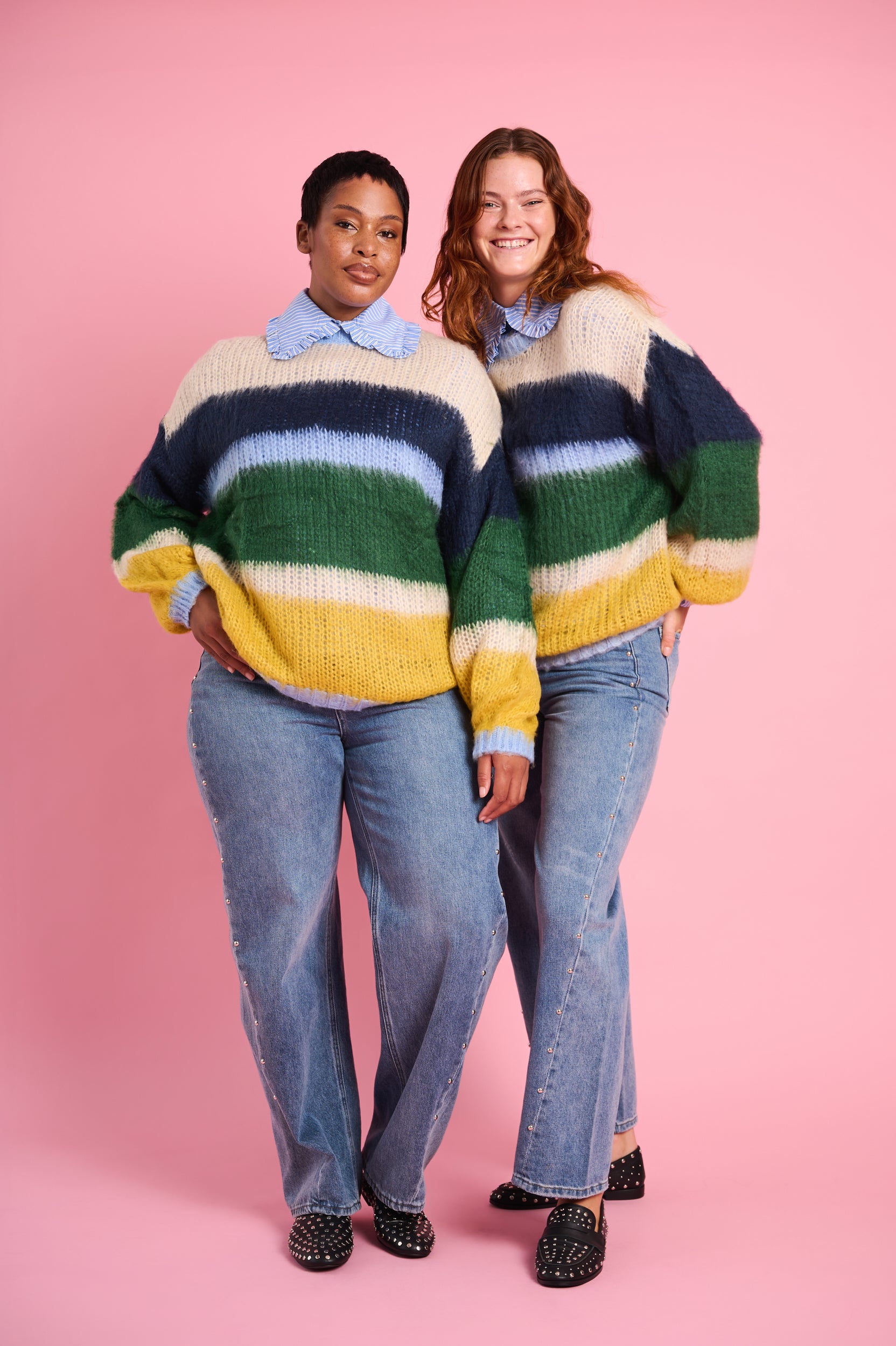 Models are wearing multi stripe fluffy jumper with blue denim jeans 