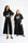 Models are wearing black pants and a black short with black shoes