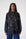 Model is wearing a bellow button down shirt that is slightly sheer with lipstick embroidery 