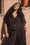 Model wearing chocolate rayon-linen dress with drawstring waist