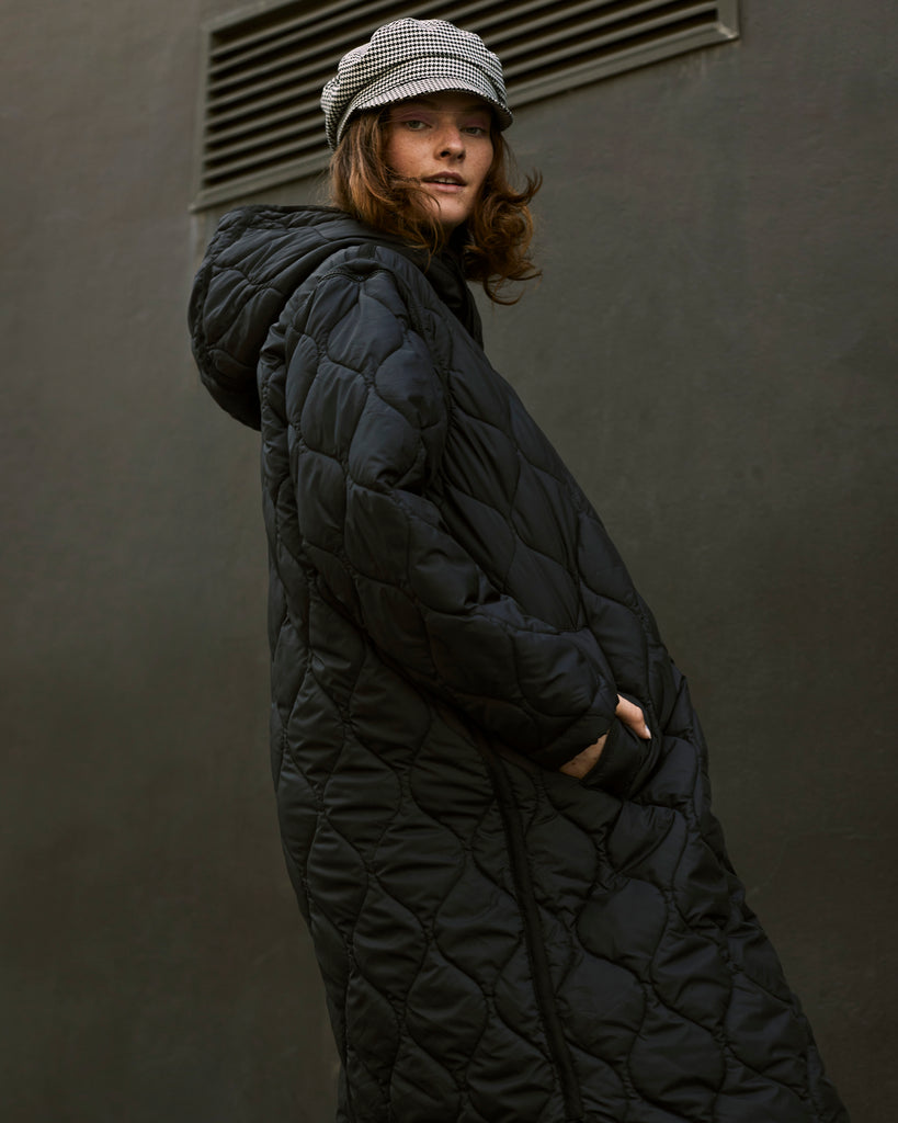 Me&B. Women's clothing. Jackets. Coats. Black puffer jacket. Black sleeveless jacket. Black hooded jacket. Winter essential.