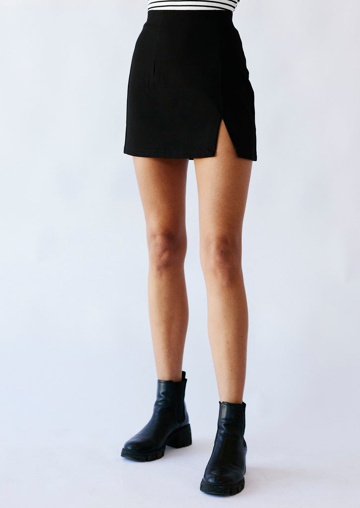 Me & B. Skirts. Women. Black mini skirt. Short black skirt. Black slit skirt. Local brands. Cape Town.