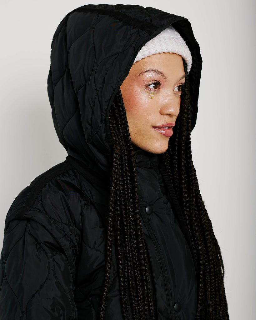 Me&B. Women's clothing. Jackets. Coats. Black puffer jacket. Black sleeveless jacket. Black hooded jacket. Winter essential.